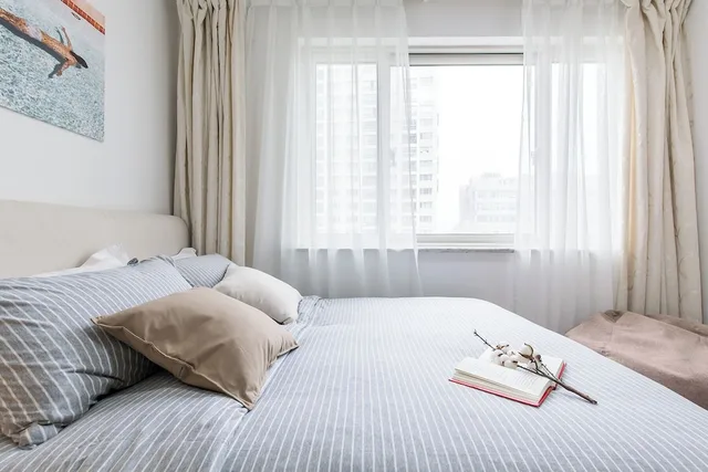 2 Bedrooms, Senior, Apartment, 2 Queen Beds, Kitchen, Book and Bed-People's Square 1/10