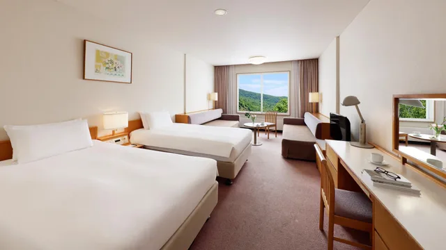 غرفة عائلية بسريرين منفصلين في المبنى الرئيسي للمدخنين، Manza Prince Hotel 1/1