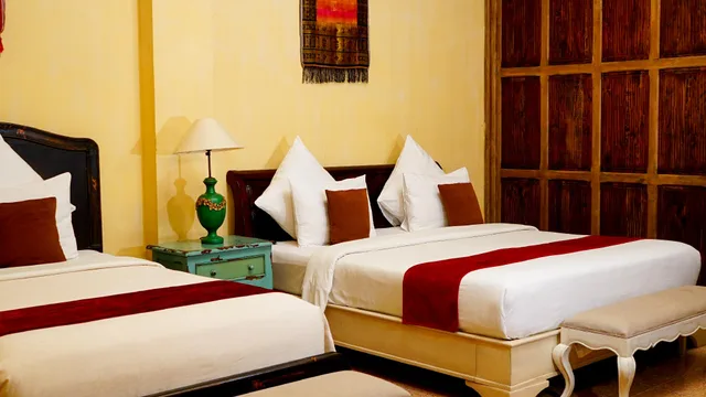 غرفة عائلية بسرير كوين وسرير فردي، Kayu Arum Resort 2/2