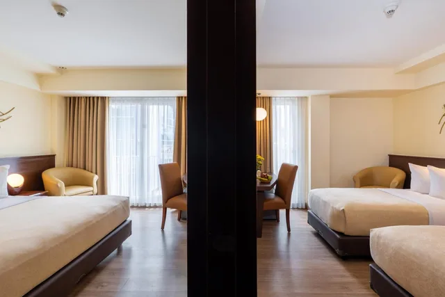 غرفة متصلة ديلوكس بسرير مزدوج وسريرين منفصلين، The Atanaya Hotel Bali 6/10