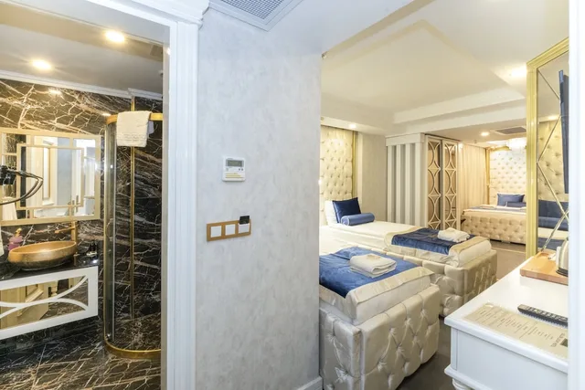 غرفة ديلوكس رباعية بسرير مزدوج وسريرين منفصلين، Les Lion Luxury hotel & spa 4/4