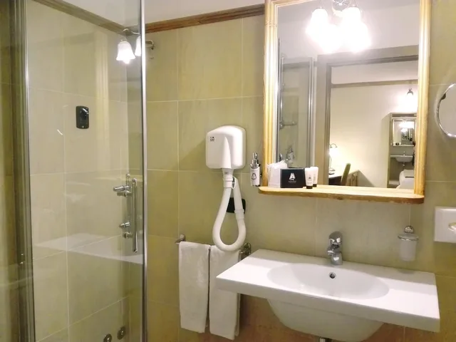غرفة ثلاثية بسرير مزدوج مع أريكة، Le Miramonti Hotel And Wellness 2/2
