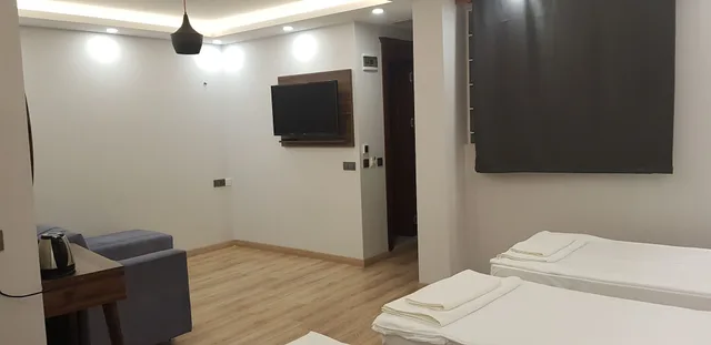 غرفة عائلية بسرير كوين وسريرين منفصلين، Basilissis Hotel 3/4