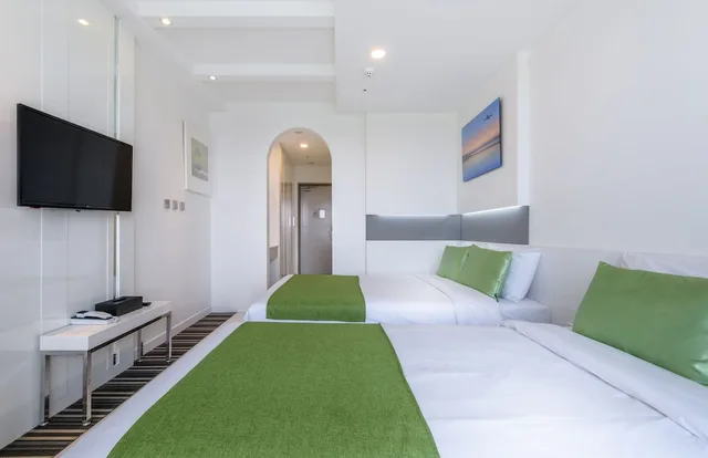 Green, Family, Twin Beds, Partial Sea View، Aimi Jeju Beach Hotel 5/8