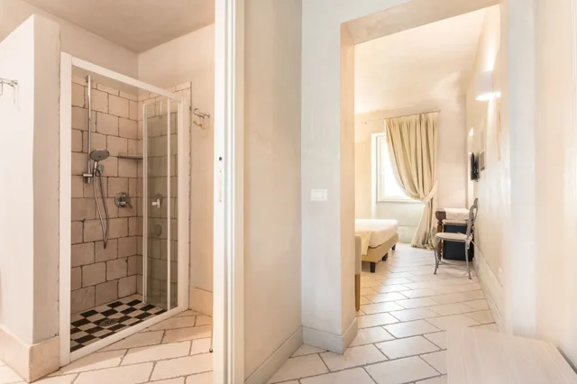 غرفة بسريرين منفصلين مع أريكة في الملحق، Maison Tresnuraghes 8/10