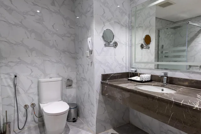غرفة عائلية بسرير كينج وثلاثة أسرّة، فندق وأجنحة تايم ربا(TIME Ruba Hotel & Suites) 4/8