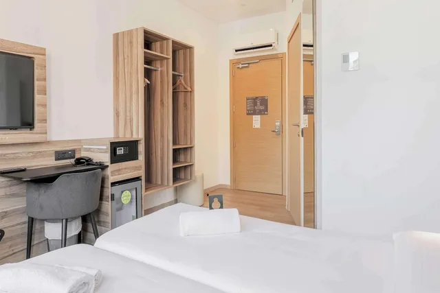 غرفة قياسية بسريرين منفصلين، B&B HOTEL Prato City Center 3/7