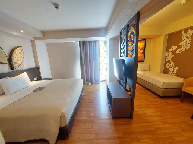 جناح جونيور بسرير كينج وسرير فردي، The Atanaya Hotel Bali 6/10
