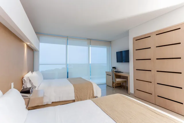 غرفة قياسية بسريرين منفصلين، Sonesta Hotel Cartagena 1/2