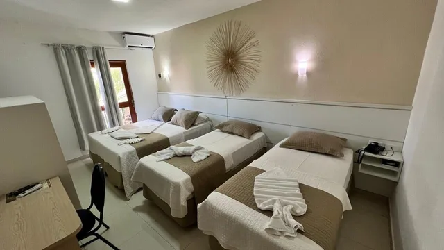 غرفة رباعية بإطلالة جزئية على البحر، Pousada dos Jangadeiros 5/5