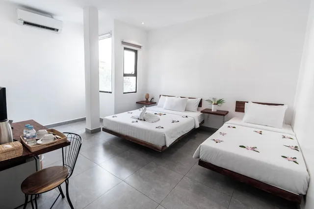 غرفة ديلوكس ثلاثية بسرير كوين وسرير فردي، Onederz Hostel Siem Reap 4/5