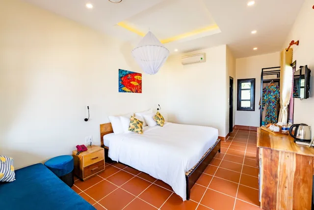 شقة سكنية بسرير كينج بإطلالة على الحديقة مع أريكة، Hula Hula Beachfront Phu Quoc 3/10