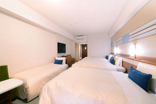 غرفة قياسية رباعية بأربعة أسرّة وسريرين منفصلين بإطلالة على البحر في الملحق، Vessel Hotel Campana Okinawa 1/5