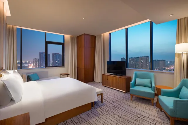 جناح بسرير كينج بغرفة نوم واحدة مع دخول الصالة، Holiday Inn Tianjin Xiqing 2/8