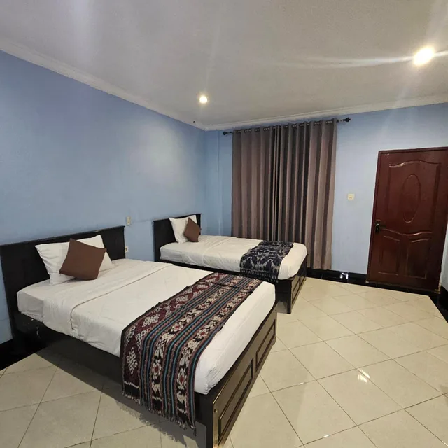 غرفة قياسية بسريرين منفصلين بإطلالة على الحديقة، Ridho Malik Hotel 5/7