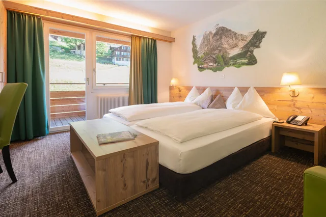 غرفة قياسية بسريرين منفصلين، Hotel & Restaurant Alpina in Grindelwald 1/1