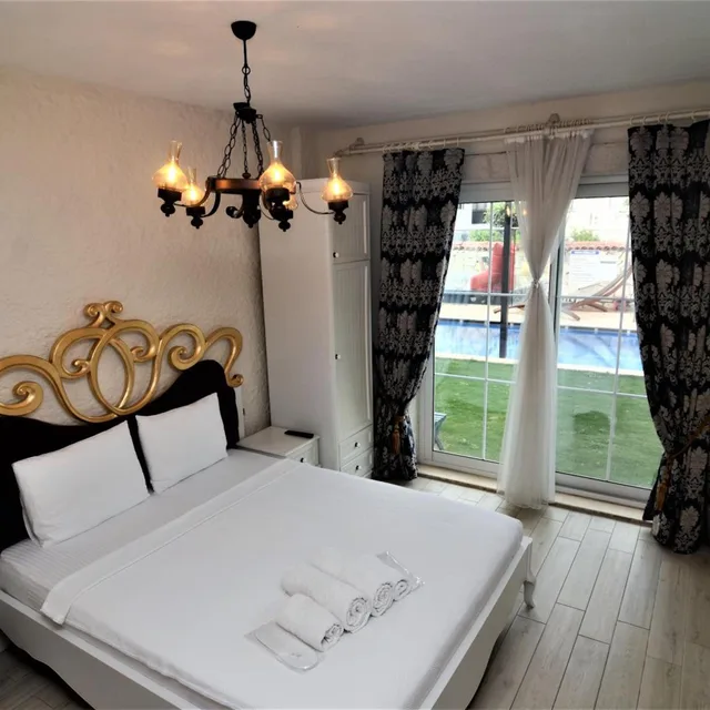 غرفة ثلاثية بإطلالة على المسبح، Alacati Grand Eldoris Otel 6/10