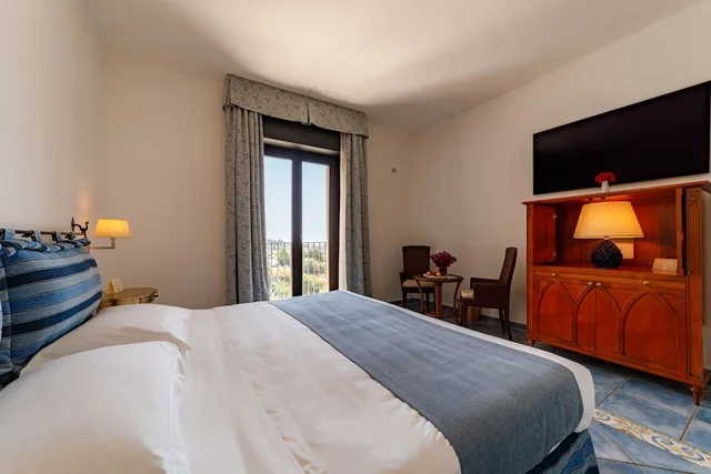غرفة ديلوكس ثلاثية بسرير كينج، Alberi del Paradiso Hotel 1/10