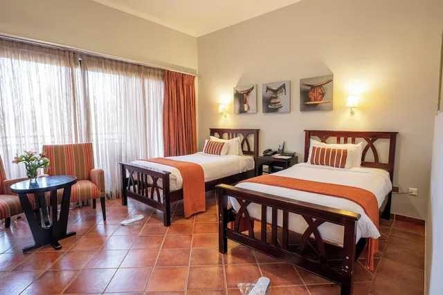 غرفة بسريرين منفصلين بإطلالة على الحديقة، Haile Resort Hawassa 2/9