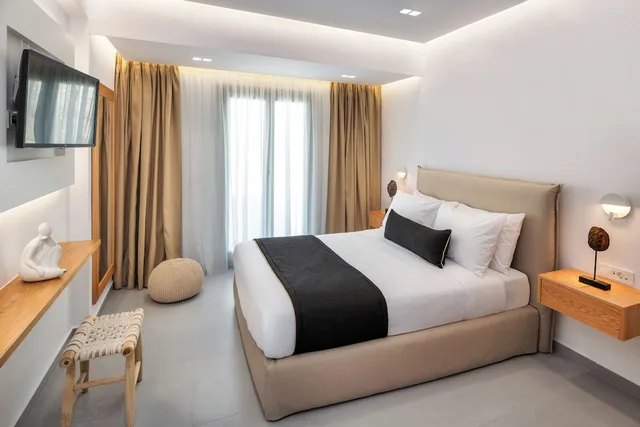 جناح ديلوكس بسرير كوين مع أريكة، Harmony Suites 8/10