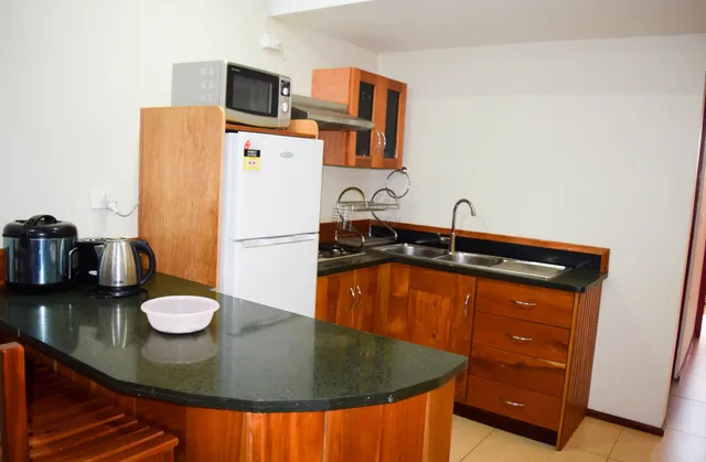شقة ديلوكس بسرير كينج وسريرين منفصلين بغرفتي نوم، Al-Minhaj Service Apartments 5/5