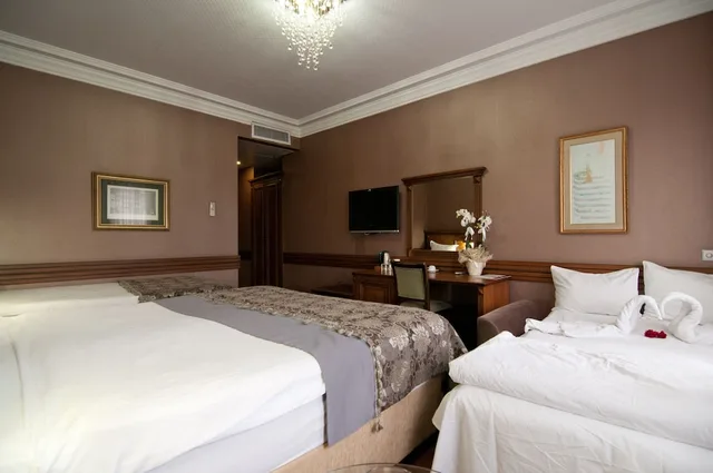 غرفة عائلية بسرير كينج وسرير فردي بإطلالة على البحر مع أريكة، FERMAN HOTEL 2/5