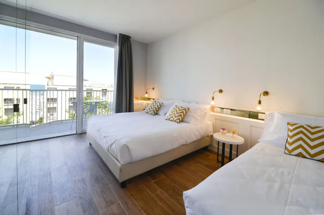 جناح عائلي بسريرين مزدوجين مع أريكة، Residence Ten Suite 1/9