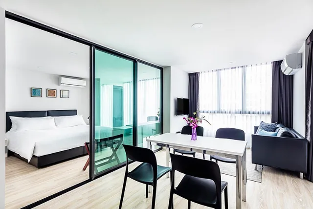 جناح بريميير بسرير كينج وسرير فردي، The Rizin Hotel 1/1