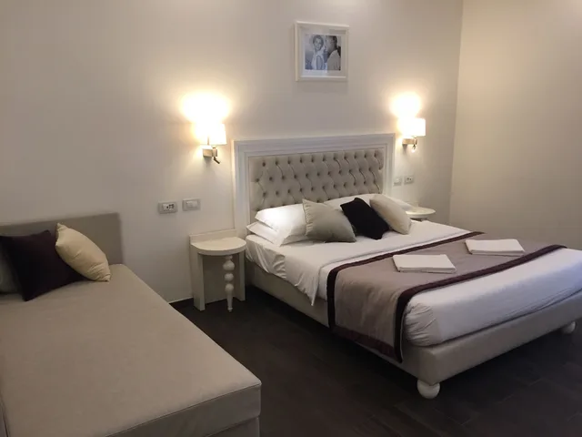 غرفة رباعية بسرير مزدوج وسريرين منفصلين، Relais Monti 1/1