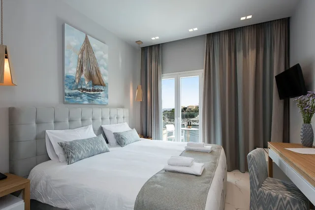 غرفة بسرير مزدوج بإطلالة جزئية على البحر، Melina Bay Boutique Hotel 1/8
