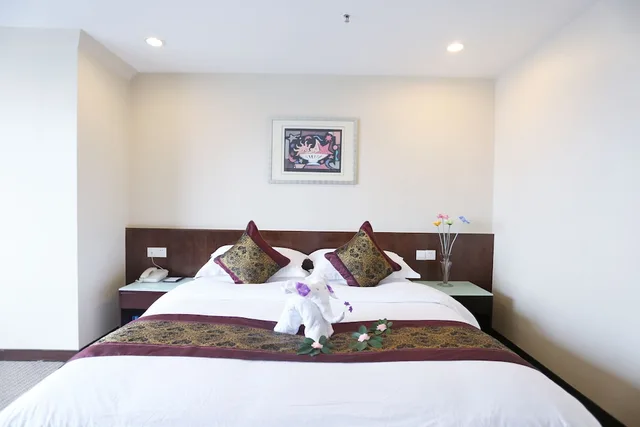 غرفة ديلوكس بسرير كينج، Yihe Business Hotel Guangzhou 1/7