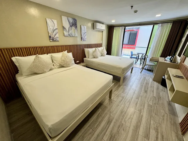 غرفة بريميير بسريرين كوين، Red Coco Inn de Boracay 1/9