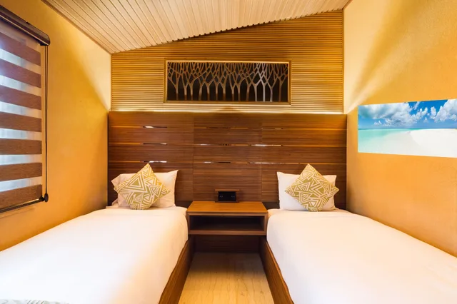كوخ سوبيريور بسرير كينج وسريرين منفصلين بإطلالة على الحديقة بغرفتي نوم، Kokomo Botanical Resort 4/4