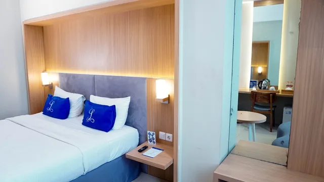 غرفة ديلوكس بسرير كوين، Hotel Laksana Solo Managed by Dafam 4/7