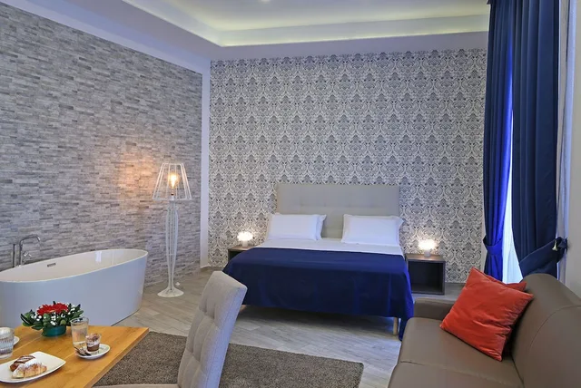 غرفة رئاسية بسرير كوين مع أريكة، Napoli Rooms&Suite 4/8