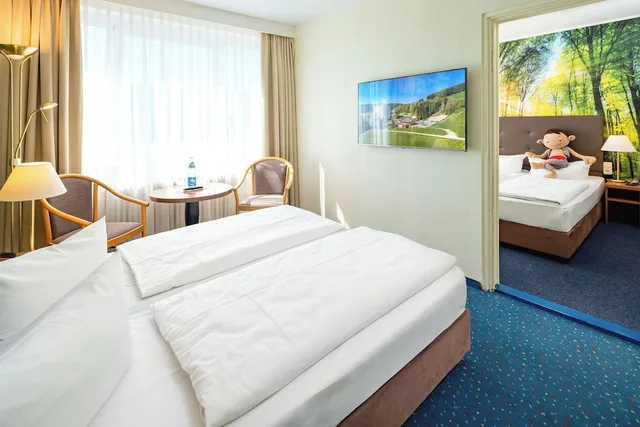 غرفة عائلية بسريرين كوين بإطلالة على الحديقة بغرفتي نوم، Ahorn Hotel Am Fichtelberg 2/6