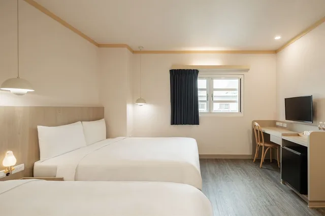غرفة كومفورت رباعية بسريرين مزدوجين، Kindness Hotel Min Sheng 1/6