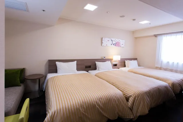 غرفة ثلاثية بسريرين مزدوجين، Spa Land Hotel Naito 1/1