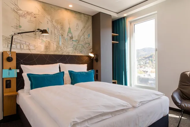 غرفة قياسية بسرير كوين، Motel One Freiburg 4/7