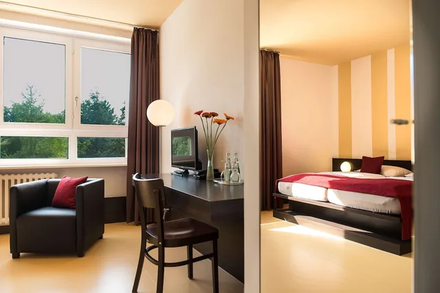 غرفة ثلاثية بسرير كوين بإطلالة على الحديقة، TOP EMBRACE Hotel Grenzfal 4/5