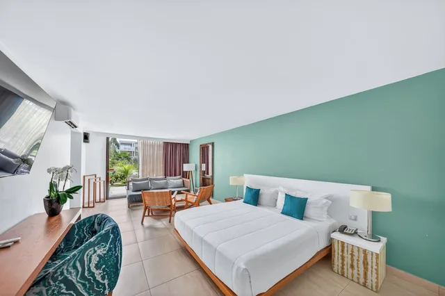 غرفة جونيور سوبيريور بسرير كينج مع أريكة، Hommage Hotel Residences 4/10