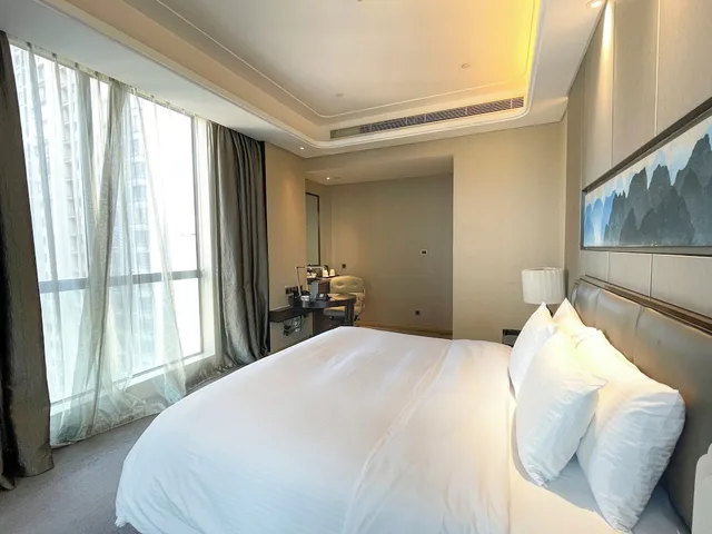 غرفة غراند ديلوكس بسرير كينج، Wanda Realm Longyan 1/5