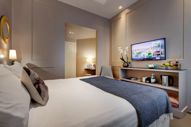 غرفة بسرير كوين، Singer Palace Hotel 2/5