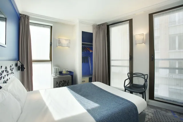 غرفة متصلة بسرير مزدوج وسريرين منفصلين، Eiffel Capitol Hotel 4/6
