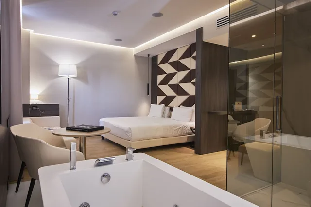 جناح ديلوكس بسرير كوين وسرير فردي، Ih Hotels Milano Ambasciatori 3/4