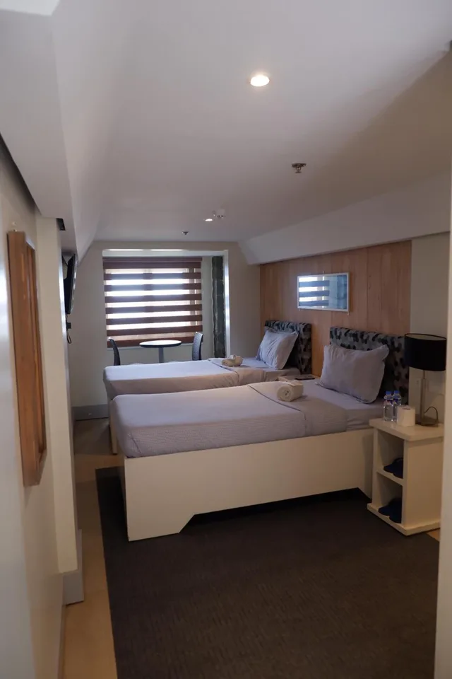 غرفة ديلوكس بسريرين منفصلين، OYO 492 Sunset View Ridge Residences 3/10