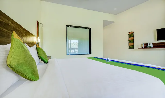غرفة ديلوكس بسرير كوين بشرفة، Treebo Jp Cottage 5/5