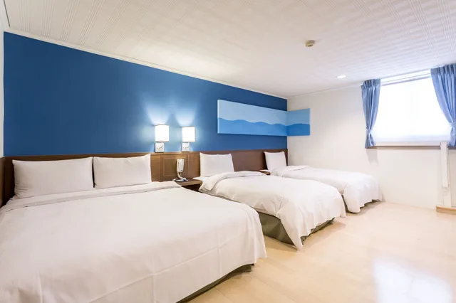 غرفة قياسية رباعية ركنية بسرير مزدوج وسريرين منفصلين، MF Hotel Penghu 2/5