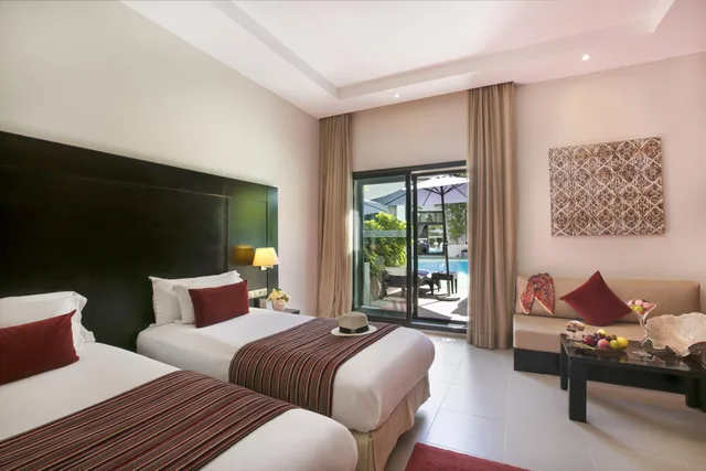 غرفة بسريرين منفصلين بإطلالة على المسبح، Kech Boutique Hotel and Spa 4/10