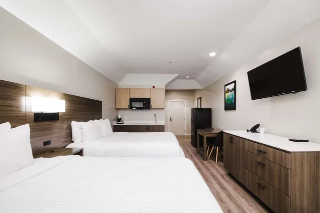 Room, 2 Queen Beds, Kitchenette, SureStay Studio by Best Western Conroe Downtown 1/9